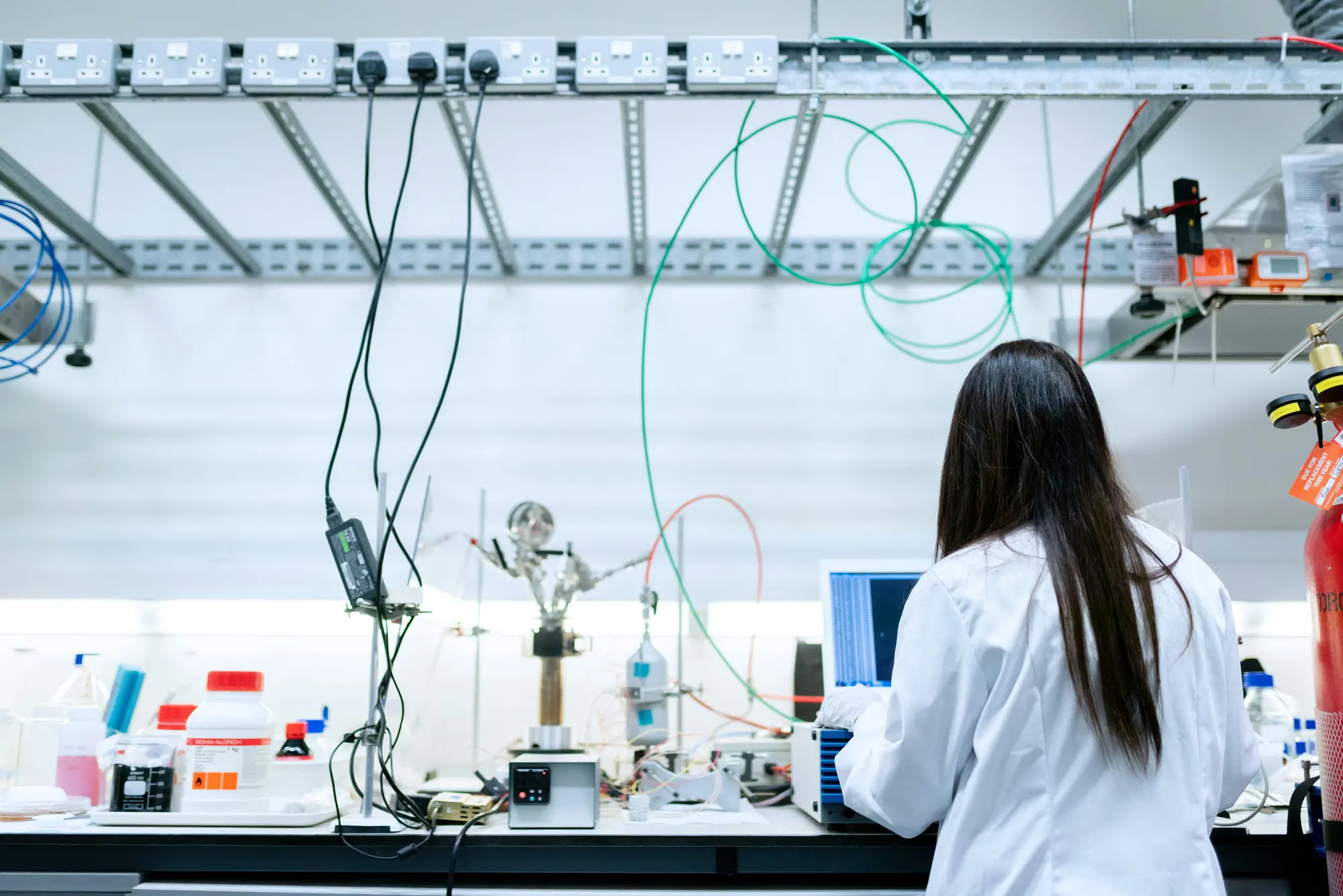 A scientist working at a lab bench