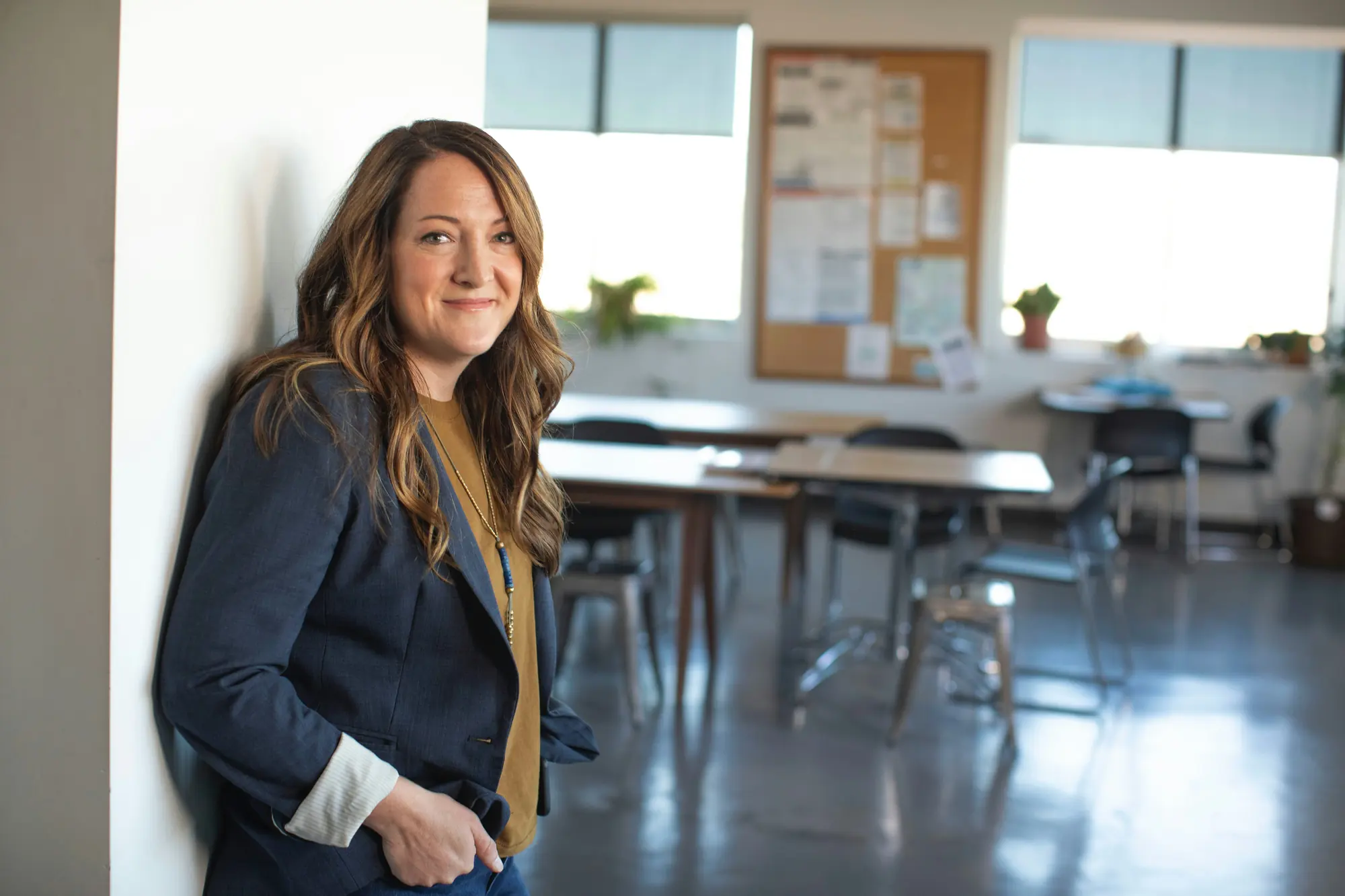 A founder standing in her office